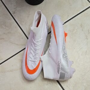 Nike White and Orange Athletic Shoes with High-Top Design